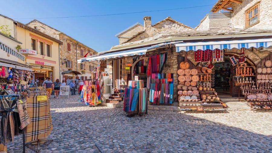 Mostar-old-town-street-with-shops-and-historic-architecture.jpg